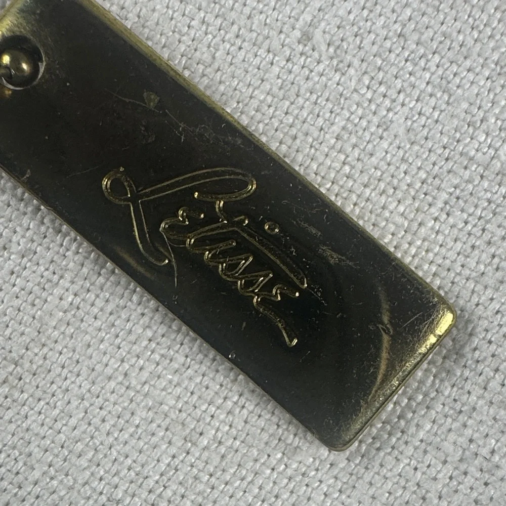 Letisse double sided gold bag charm tag